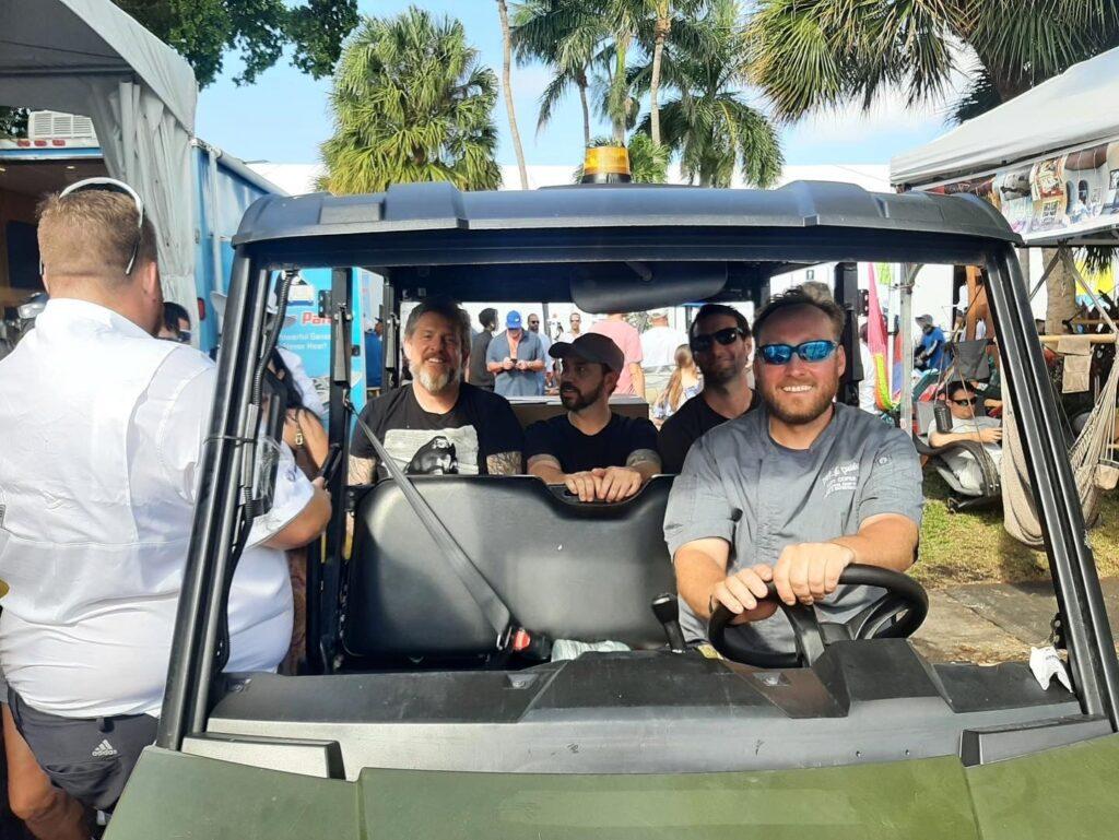 people riding in golf cart in florida