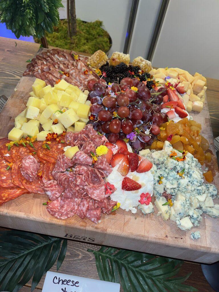 cheese and charcuterie on wooden board