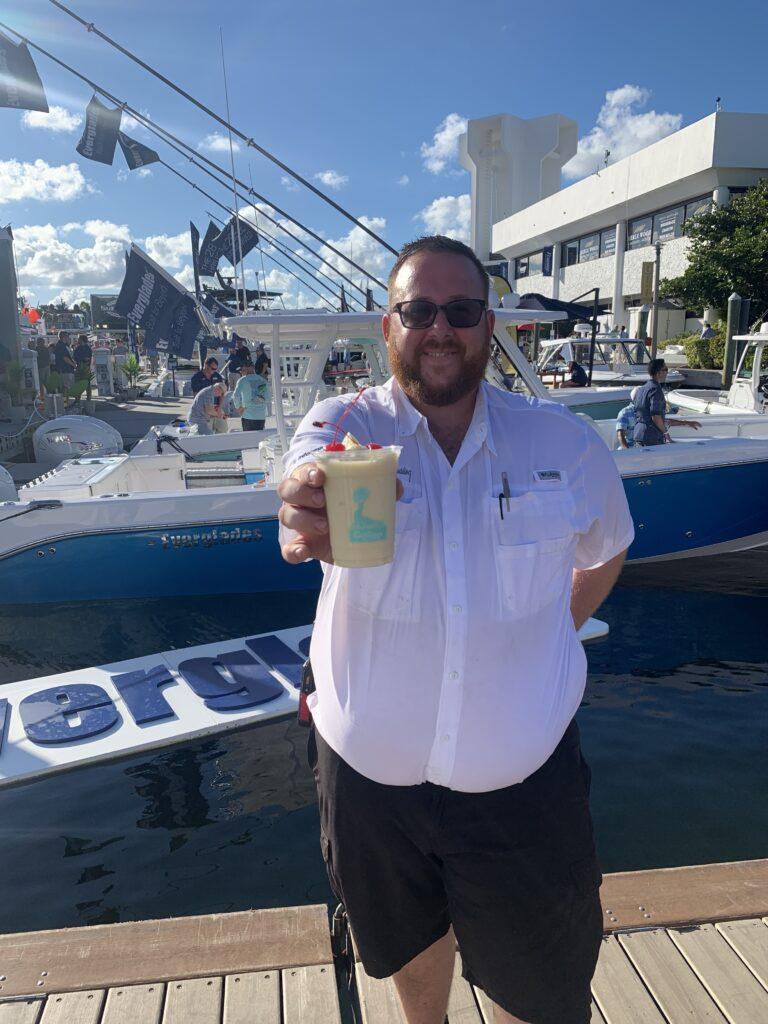 man giving a drink to guest