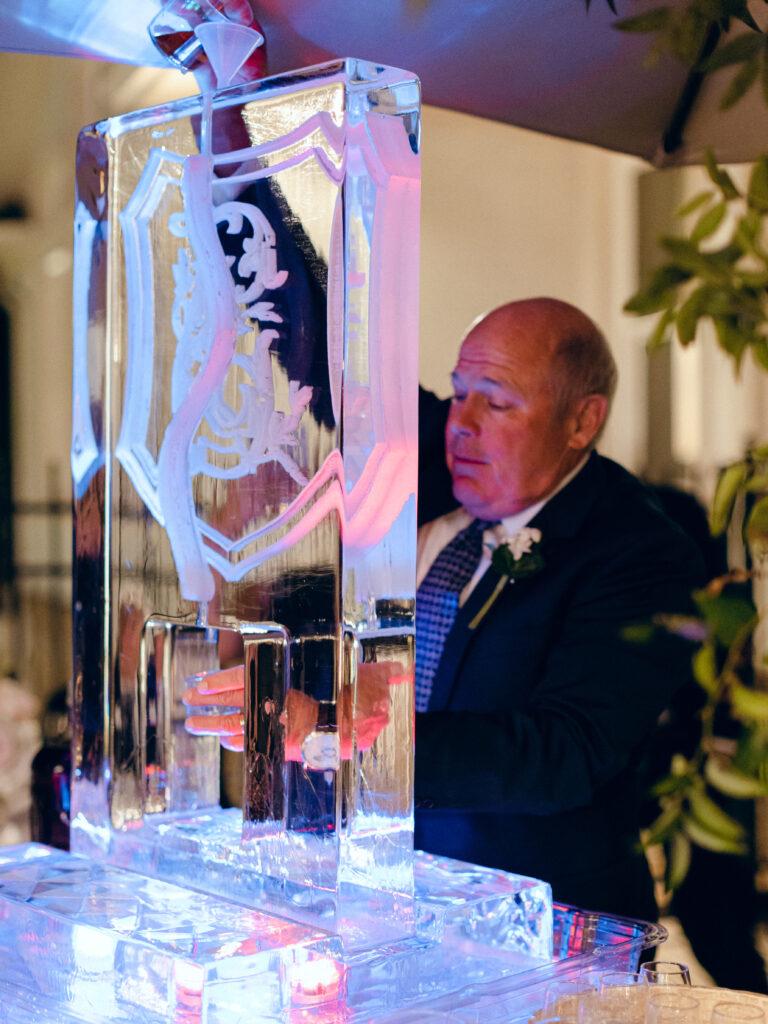 wedding guest at ice luge