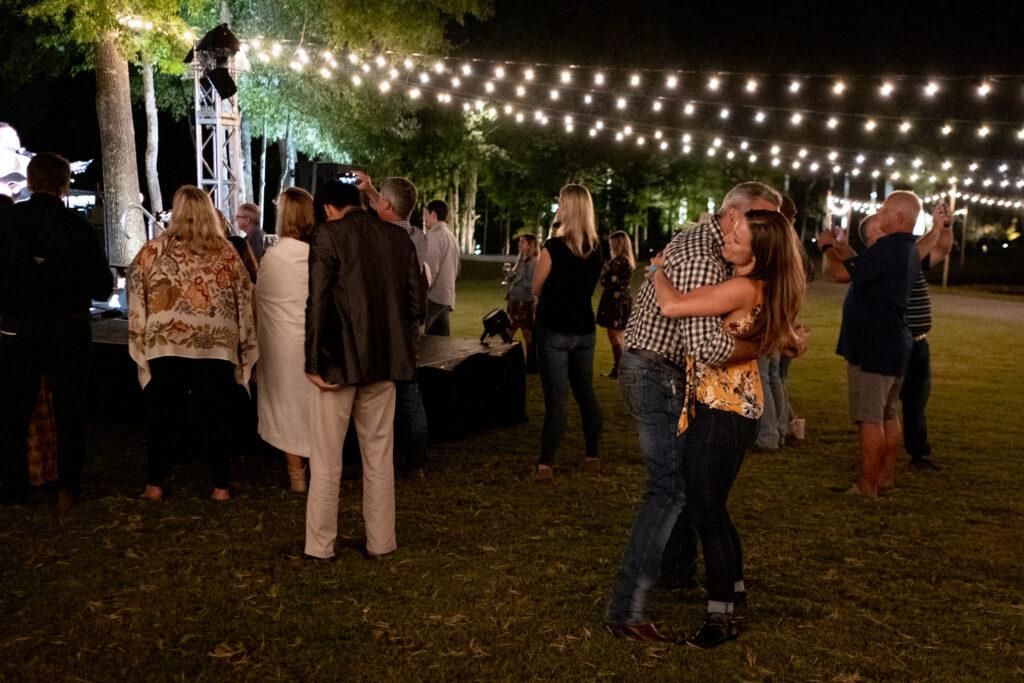 people dancing at outdoor event