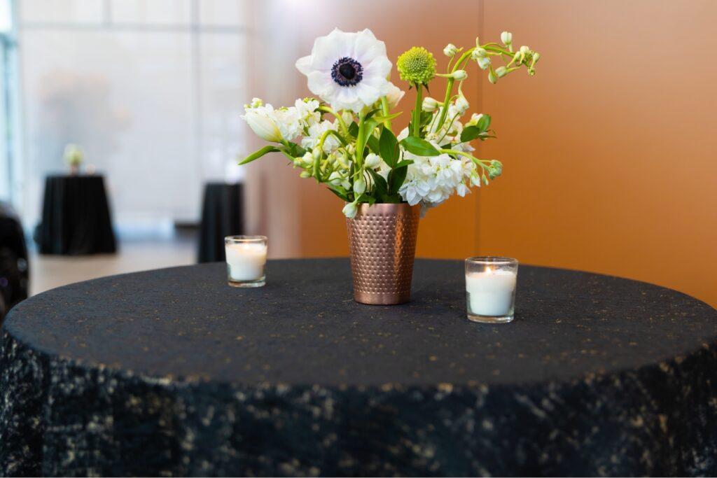 floral centerpieces with sequin tablecloths