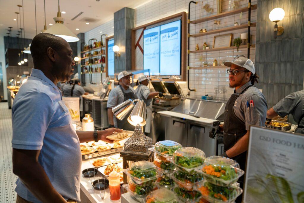 salad station with employees