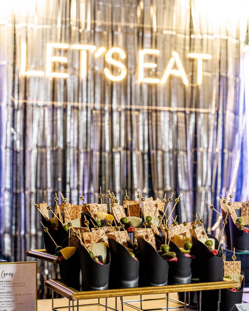 catering station with neon sign