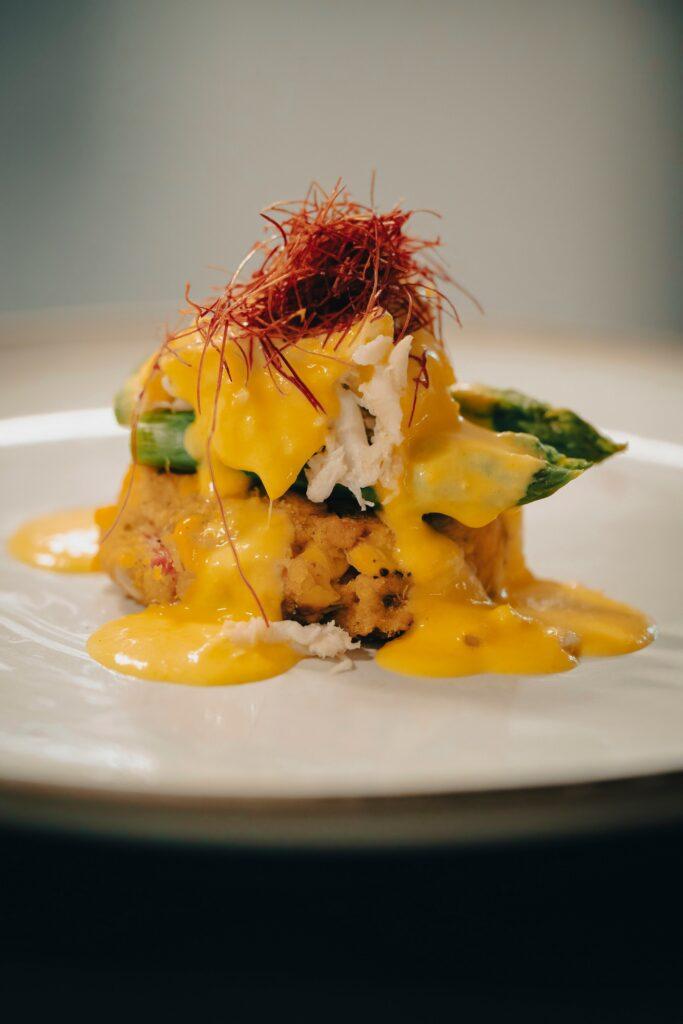 Corn Crab Cake with Roasted Asparagus and Orange Beurre Blanc