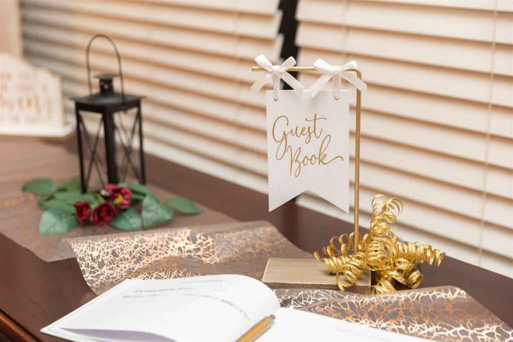 Guest book table with decor