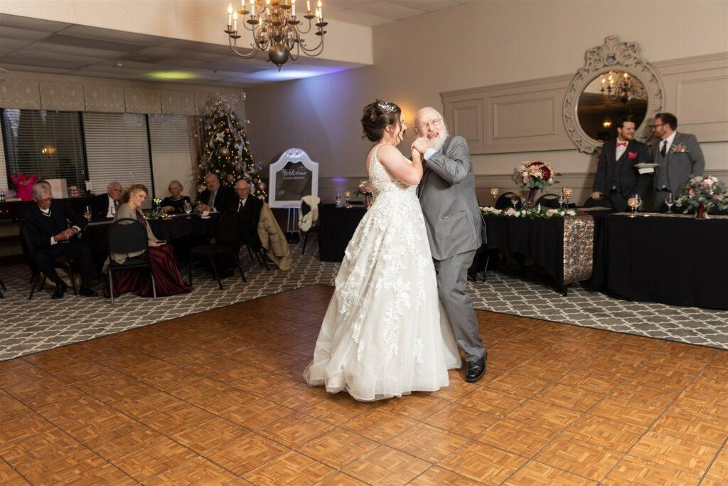 Bride dancing with her father