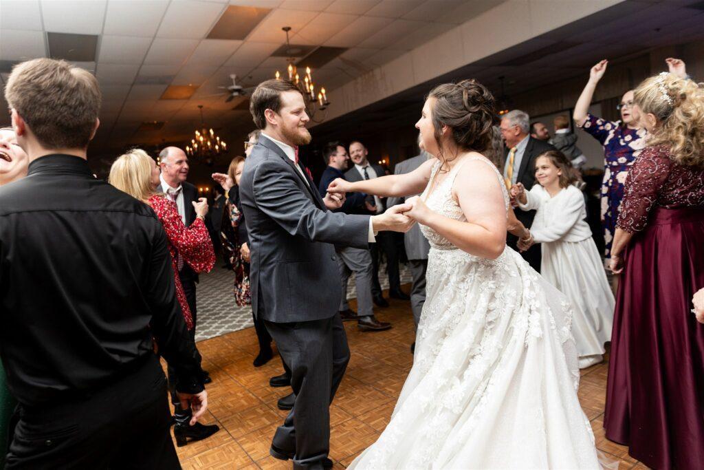 Bride and groom dancing on the dancefloor